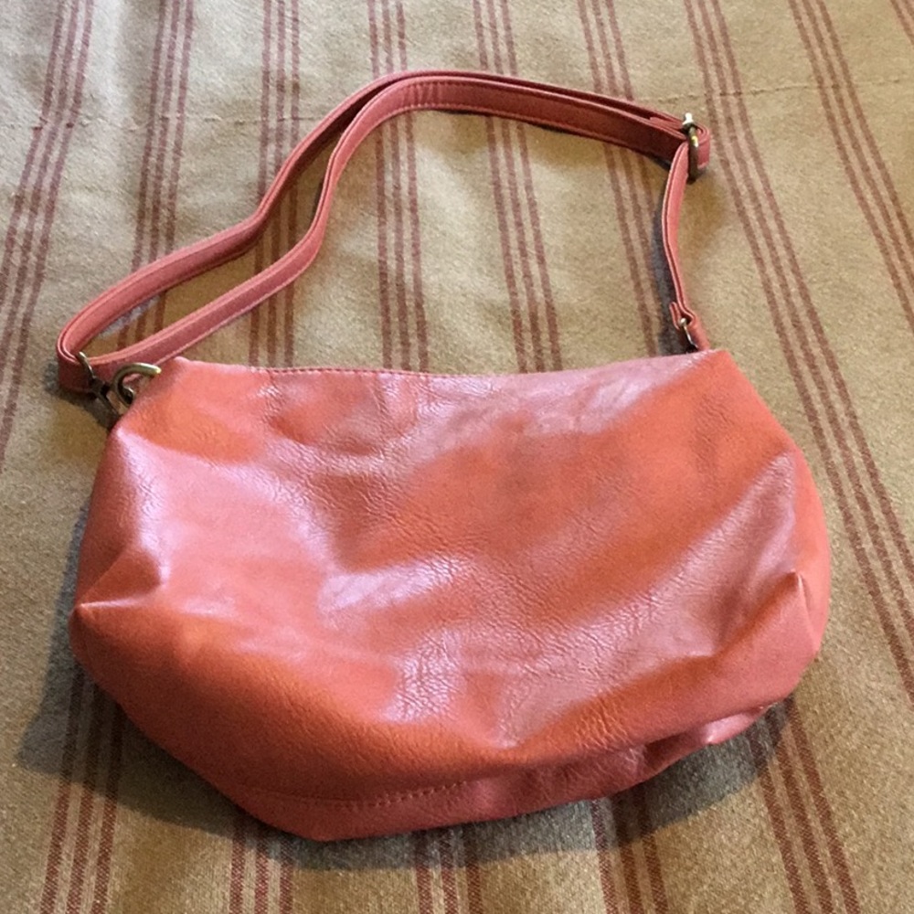 Susan Joy bag with adjustable strap, inside cloth flowered lining, clip on strap